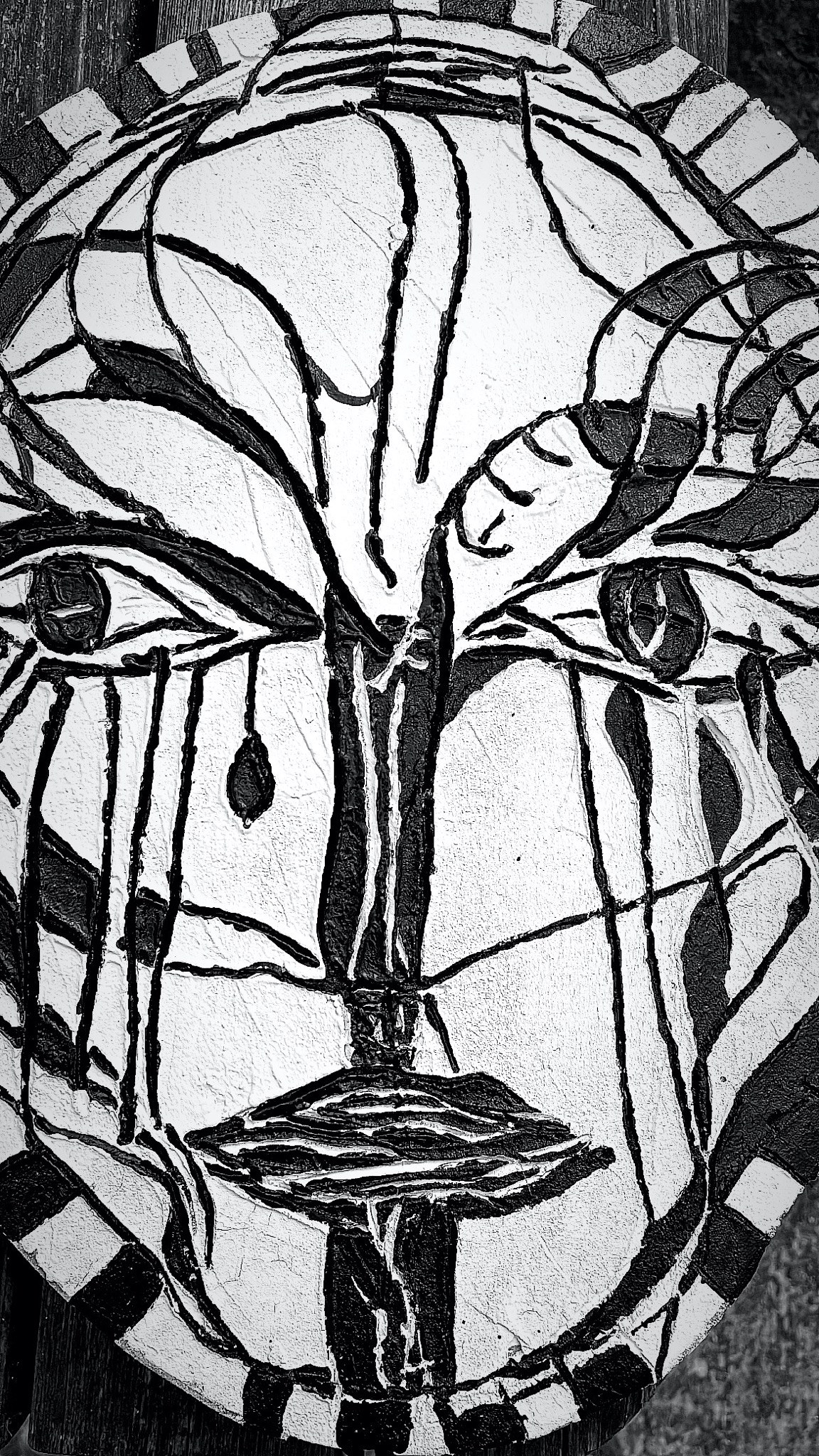 Detailed black and white face from the series