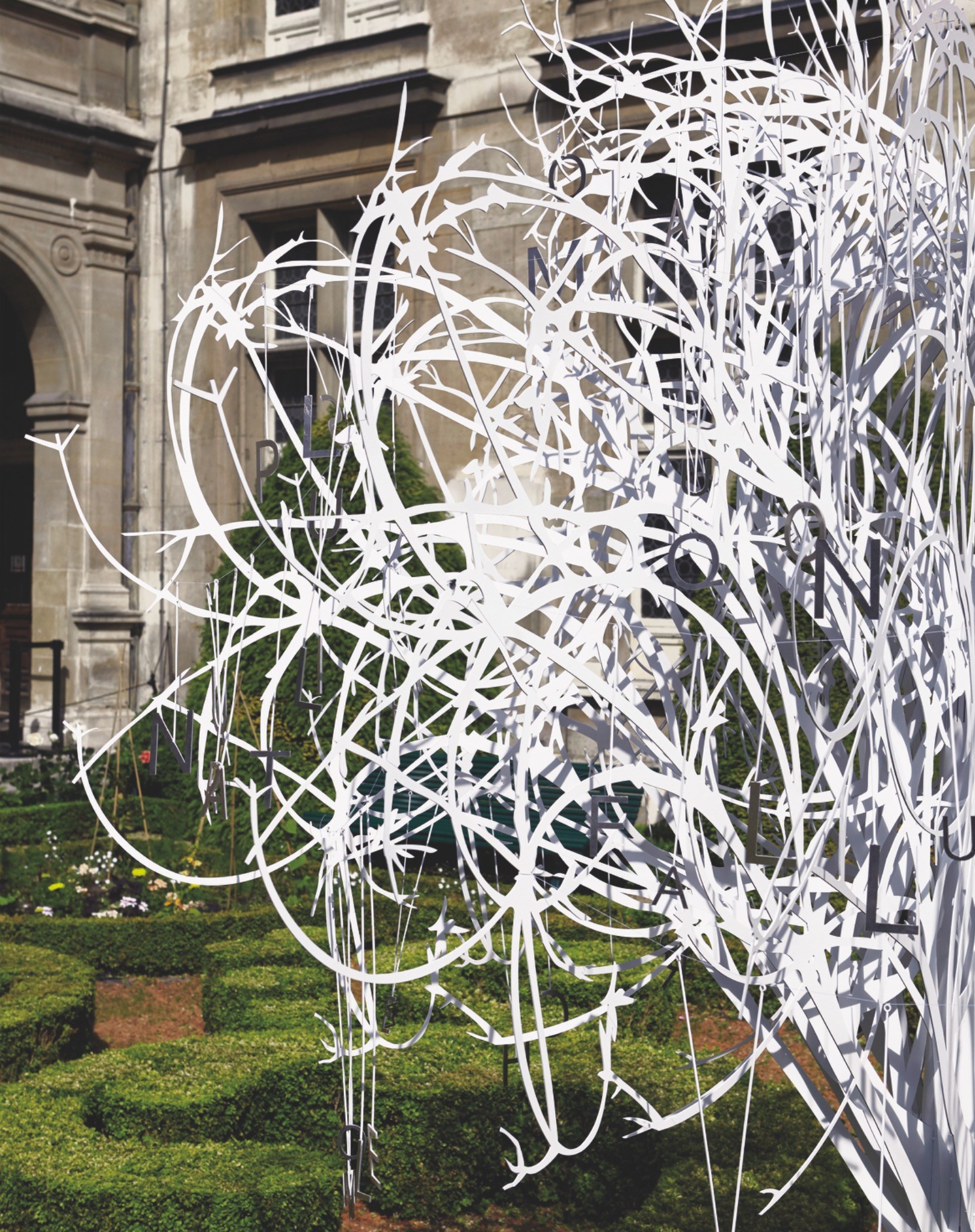 Detail of L’Arbre à l’Être letters and branches